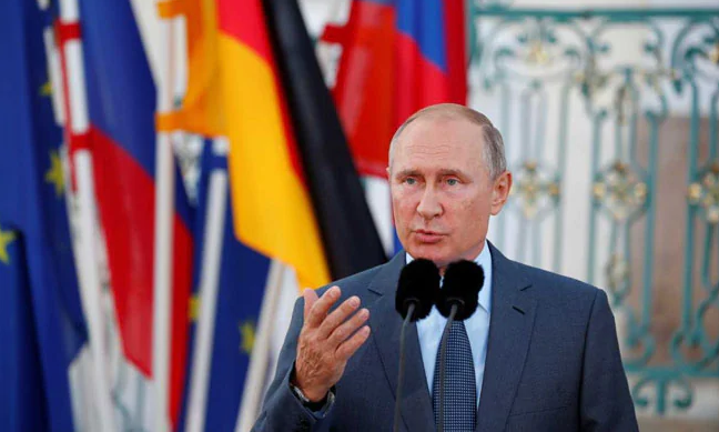 Путин и претседателот на СЗО на отворањето на ЗОИ