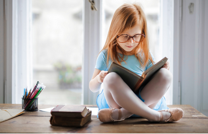 Меѓународно истражување: Читањето печатени наместо е-книги, подобро го развива интелектот кај децата